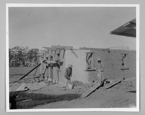 Two Workers, Adobe Construction
