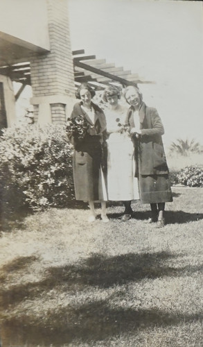 Three Women Standing Outside Patio