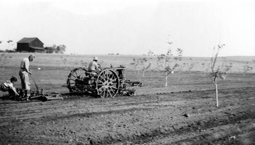 Tractor and Planting Device in Field