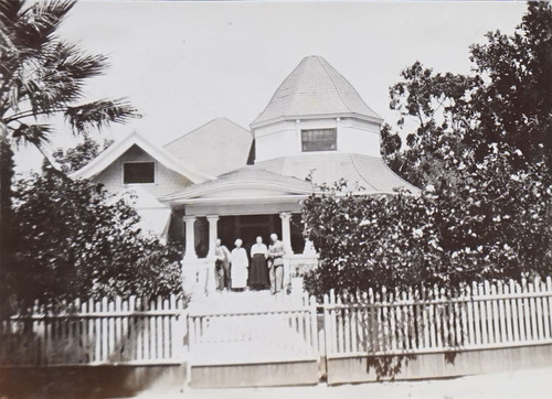 E.W. Daily Home with Four People on Front Porch