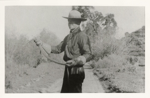 Man Holding a Snake