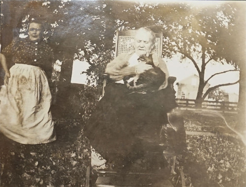 Mrs. Crowley in Rocking Chair Outdoors with Cat