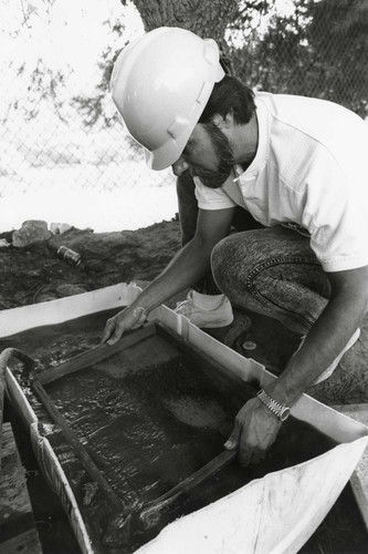 Tom Kelly Sifting Dirt