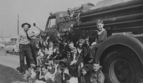 Eugene Putnam and Group of Children