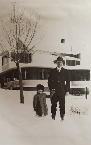 Man with Child in Snow