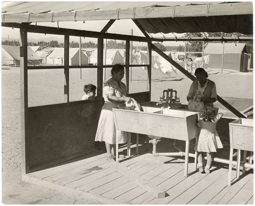 Women Doing Laundry at FSA Camp