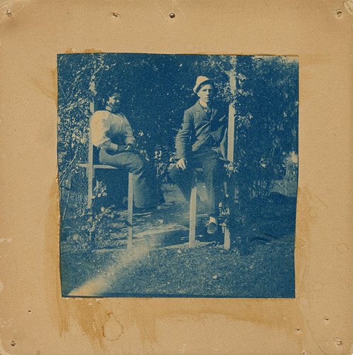 Couple Sitting in Garden