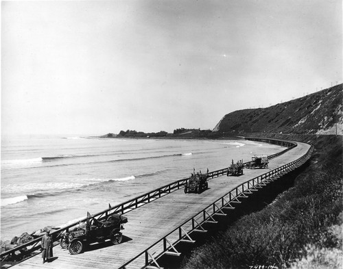 Automobile Caravan on Causeway