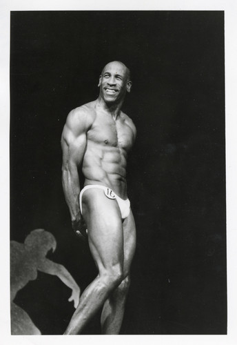 Emmet Littleton Poses as Part of a Bodybuilding Competition