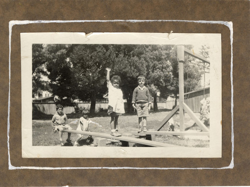 Four Children on a Playground Outside Palm Street Kindergarten