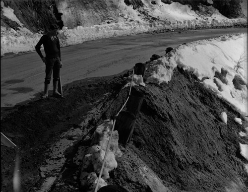 Floods and Storm Damage, Storm damage to highway. Individual unidentified