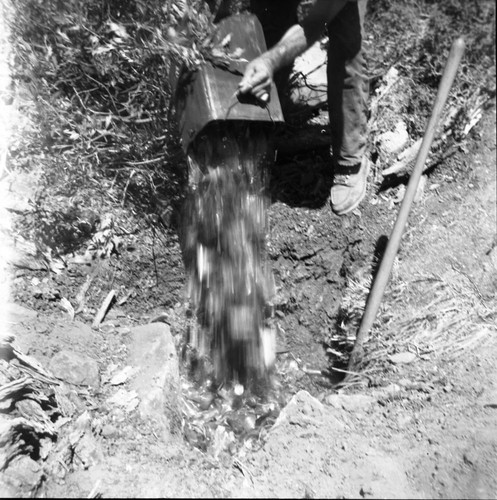 Backcountry cleanup, burying broken glass