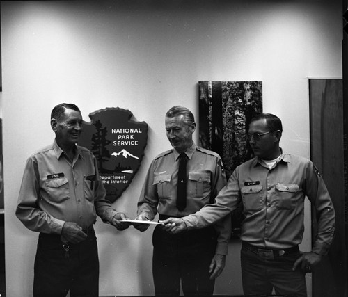 NPS Groups, Middle: Troy Hall, Right: Steve Wright presenting cash to Superintendent McLaughlin (left) for flower fund. Park Superintendents