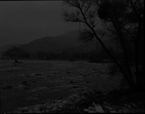 Wayne Alcorn, Three Rivers, Floods and Storm Damage, Middle Fork Kaweah River, Flood damaged Highway 198. View up Canyon from bridge crossing South Fork Kaweah River. 560100