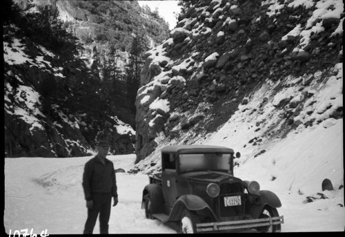 Kings Canyon, Sequoia Nat. Forest, Vehicle and equipment, misc. geology. Glacial outwash and riverbed remenants in roadcut near Grizzly Creek. Individual unidentified. Truck seems old for a 1952 photo