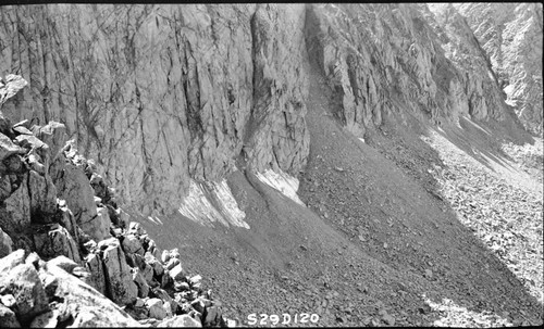 Trail routes, Talus slopes, westerly from the pass, showing the north face of Mt. Genevra with snow present September 22, 1929. A possible route but not preferred
