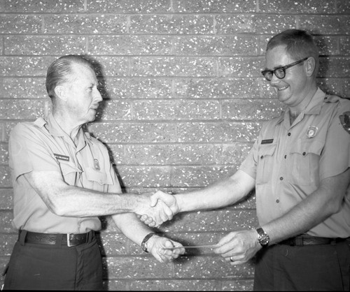 NPS Individuals, George H. Bowen, suggestion award by Supt. John McLaughlin, Park Superintendents