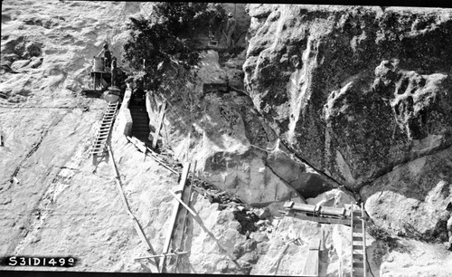 construction, ramp and first stairs under construction, left panel of a two panel panorama