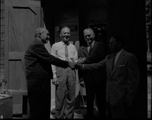 Dedications and Ceremonies, Last connections to turn electric power on at Giant Forest. Park Superintendents. Misc. Groups. L. to R. Supt. Thomas Allen, ?, George Mauger (Concessions), ?