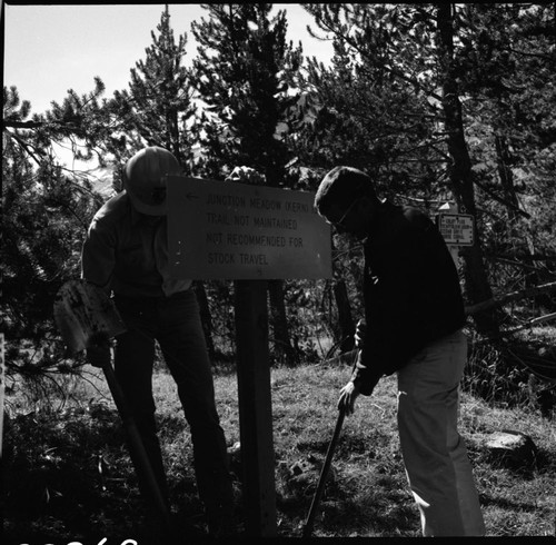 Signs, Trail sign, Grand Palace Hotel Camp. NPS Individuals, Richard McLaren on left