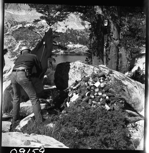 Backcountry cleanup, smashing cans