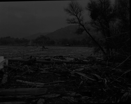 Wayne Alcorn, Three Rivers, Floods and Storm Damage, Middle Fork Kaweah River, Flood damaged Highway 198. View up Canyon from bridge crossing South Fork Kaweah River. 560100