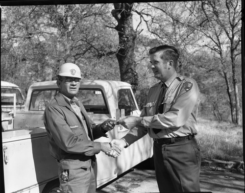 NPS Individuals, Grady Nunnelee receiving 20 year pin from Maintenance Chief Ken Bachmeyer