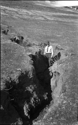 Flood and Storm Damage, erosion at Yucca Creek Camp. Individual unidentified