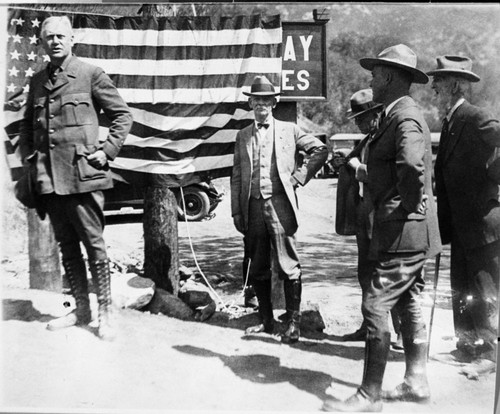 Dedications and ceremonies, informal photos of Generals Highway dedication. NPS Groups. L to R. NPS Director Stephen Mather, Col. George Stewart, Charles Whittmore, Engineer Austin (in foreground)