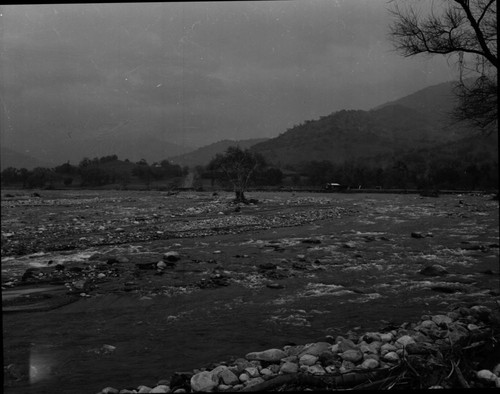 Wayne Alcorn, Three Rivers, Floods and Storm Damage, Middle Fork Kaweah River, Flood damaged Highway 198. View up Canyon from bridge crossing South Fork Kaweah River. 560100