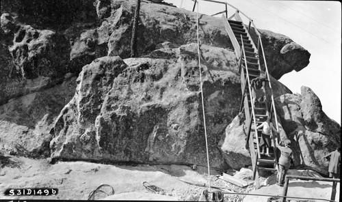 Construction, ramp and first stairs under construction, right panel of a two panel panorama, old wooden stairs still in use panel of a two panel panorama