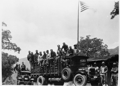 CCC Enrollees on trucks at entrance station. Vehicles & Equipment