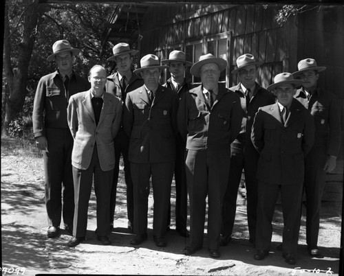 NPS Groups, New permanent rangers, L to R: Merrick, Jensen, Boyer, Kerr (Chief Ranger), Black, Scoyen (Superintendent), Anderson, Branges, Perovitch. Park Superintendents