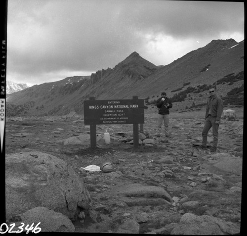 Signs, New sign at Sawmill pass. NPS Individuals, Don Sides at center, Henry LaSala on right