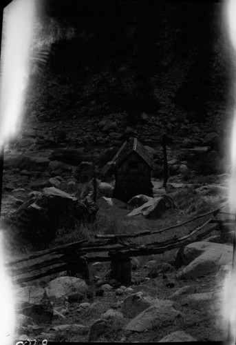 Backcountry cabins and structures, Kern Hot Springs Bathouse. Cement tub built by CCC in 1934. Cabin subsequently burned and area cleared