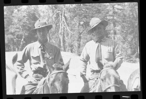 Copy photos, NPS Groups. Photo of rangers on horseback at some mountain meadow. Individuals unidentified