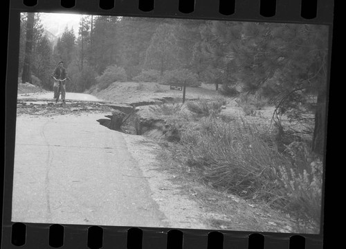 Flood and storm damage, damage to highway at Lewis Creek