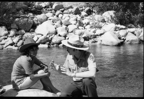 Interpretive Activities, NPS Individuals, Ranger-Naturalist George San Miguel talks to a visitor