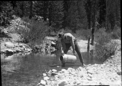 Ranger activities, planting trout fry, Slim Ellis pictured, Misc. Resource Management concerns, NPS individuals