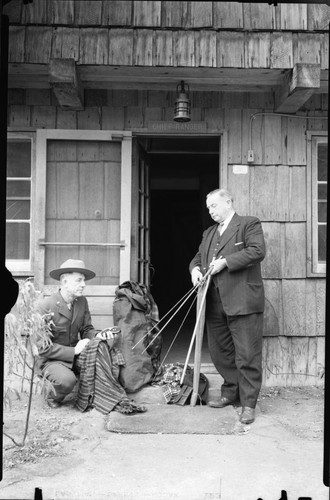 NPS Individuals, Chief Ranger John Wagner and Commissioner Mike Griffith inspecting articles stolen from High Sierra Camp