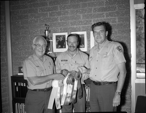 NPS Groups, Hank Schmidt (Supt.), Roy Lee Davis, John Palmer (CPI), Mule Day Awards, from California State Fair, Sacramento. Park Superintendents