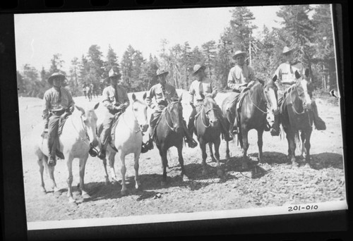 Copy photos, NPS Groups. Photo of rangers on horseback at some mountain meadow. Individuals unidentified