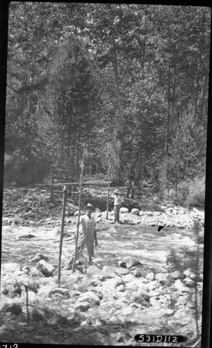 Construction, Chagoopa Bridge site, looking west, individuals unidentified