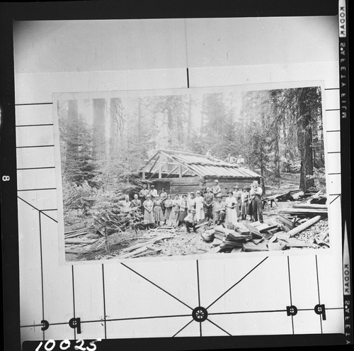 Construction, Buildings and Utilities, Historic Individuals, rebuilding Gamlin Cabin on original site, 6th from left is Mrs. Lizzie McGhee, daughter of Thomas Gamlin
