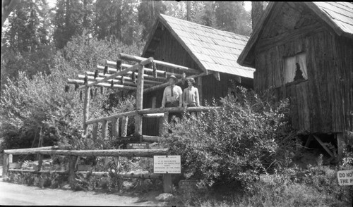 Buildings and Utilities, entrance station. Individuals unidentified