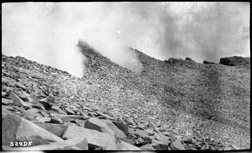 Clouds, Felsenmeer (Alpine Fell-field), cloud striking perpendicular east face of Whitney resembling steam from boiling cauldron