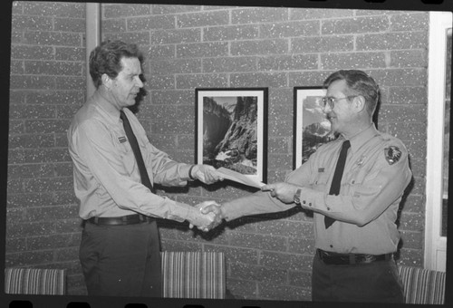 NPS Individuals, Park Superintendents, Supt. Jack Davis presenting Dave Echols a letter of appreciation for 3000 hours of volunteered time to the Administration Division