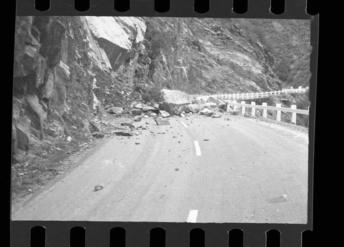 Flood and storm damage, rock slide on highway