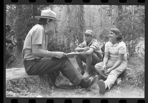 Interpretive Activities, NPS Individuals. Ranger-Naturalist Brett Bankie discusses nature with two patch program candidates