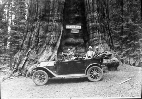 Vehicular Use, General Sherman Tree, First Auto at Sherman Tree, Dr. Combs at wheel, Mrs. Combs and son Dick